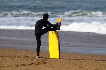 étirements sur la plage