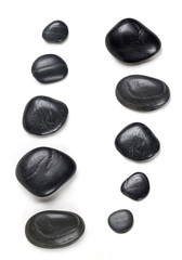 black spa stones with shadows