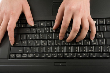 Fototapeta na wymiar Hands on keyboard