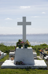 tombstone in cemetary by sea Rarotonga Cook Islands