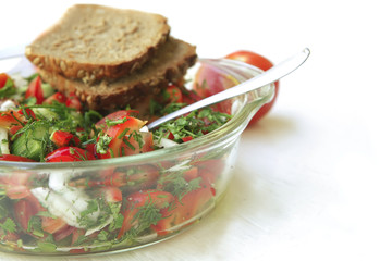 tomato salad on white table