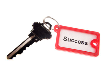 Key to success isolated on white background