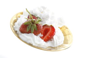 strawberry in a golden plate