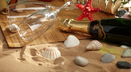 champagne sparkling on a beach