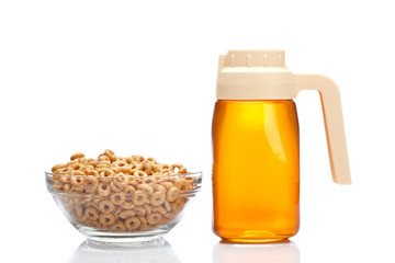Honey pitcher and cornflakes