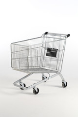 Single new unbranded shopping trolly on white background
