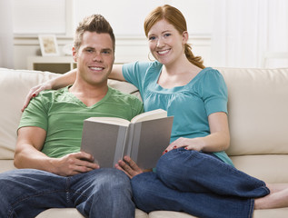 Happy Couple Reading Together