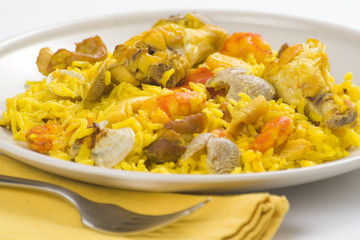 delicious seafood paella and chicken rice yellow