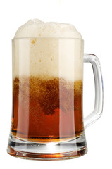 Alcohol dark beer glass with froth isolated over white.