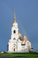 Dormition cathedral during rainbow