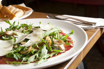 Italian carpaccio on restaurant table