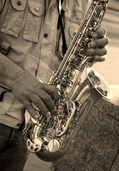 hands of saxophone player