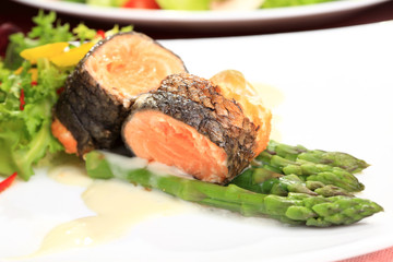 Rosemary roasted salmon served with asparagus