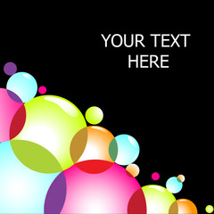 Bubbles of various colors on a black background