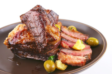 ribs on old style ceramic dish