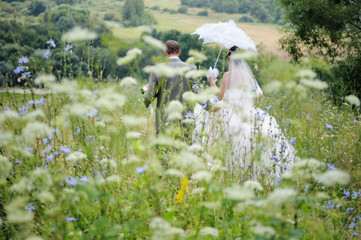 Newlywed couple on walk