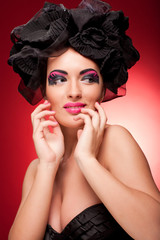 Naklejka premium Closeup portrait of a beautiful young woman. Fashion art photo