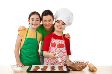 Mother with kids doing cakes isolated on white background