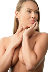 Portrait of young naked woman covering her breast