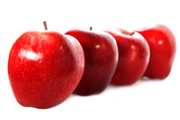 fresh red apples isolated on white