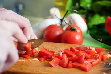 Cutting pepper into small slices