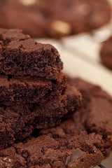 chocolate chip cookies broken on pieces and stacked