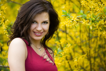 woman in garden with yellow flowers