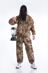 Man In Protecting Suit With a Lamp