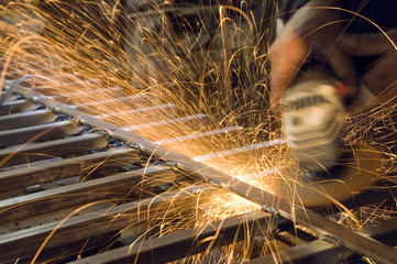 cutting metal with a grinding machine - obrazy, fototapety, plakaty