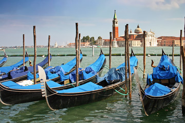 Obraz na płótnie Canvas Gondolas moored by the Piazzetta di San Marco in Venice