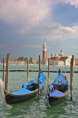 Fototapeta na wymiar Gondolas moored by the Piazzetta di San Marco in Venice