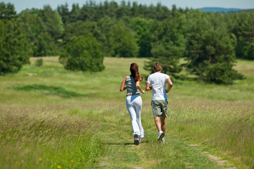 Young couple jogging outdoors