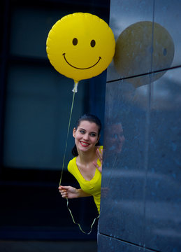 Teen Girl With Smiley Balloon