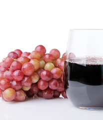Red Wine Beside Red Grape Bunch