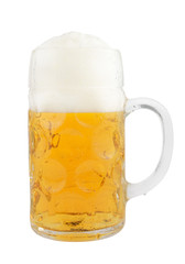 Glass of cold and fresh golden beer on white background