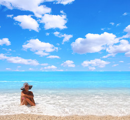 Fototapeta na wymiar Woman enjoying the sea