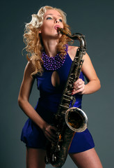 Girl with a saxophone.