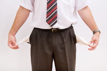 Business man with empty pockets