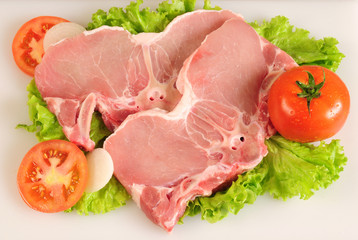 Raw meat and vegetables.