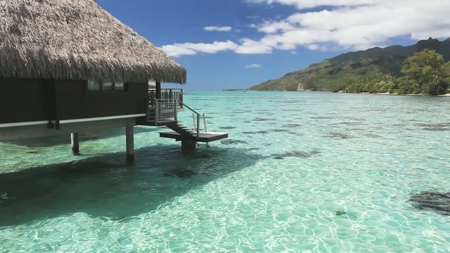 Over water bungalow with steps into amazing lagoon