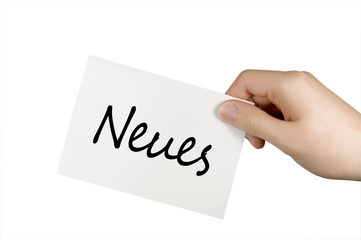 Blankokarte in einer Hand mit Neues