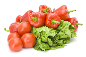 Fototapeta na wymiar red peppers and green lettuce
