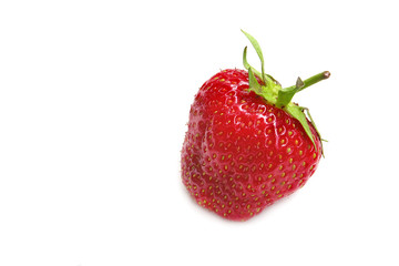 Single strawberry isolated on a white
