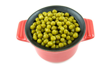 fresh peas in pan isolated on white background