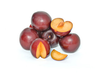 Plums isolated on white background