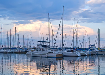 Boats and yachts moored in harbour