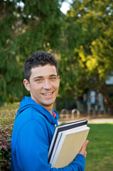 University College Student with Text Book