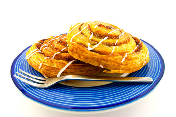Cinnamon Buns on a Blue Plate