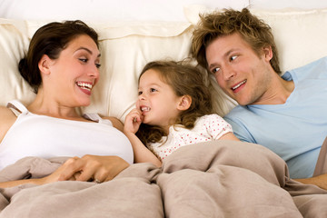 Obraz premium family in bed