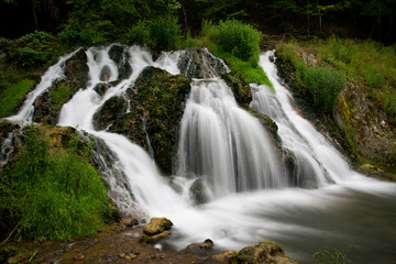 Waterfall in green forest shoot at long exposure